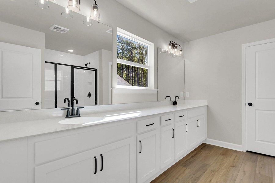 Furnished interior view inside a new home in Tea Farm: Presidents Series, Ravenel (Image 11).