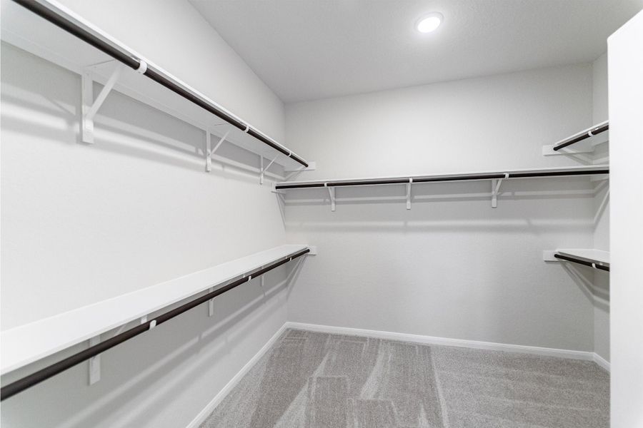 Spacious, unfurnished interior of a new home in The Woodlands at Medina Hills, Mico (Image 14).