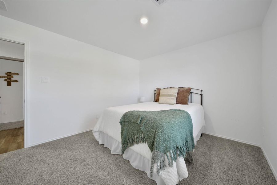 Furnished interior view inside a new home in The Canopies, Splendora (Image 24).