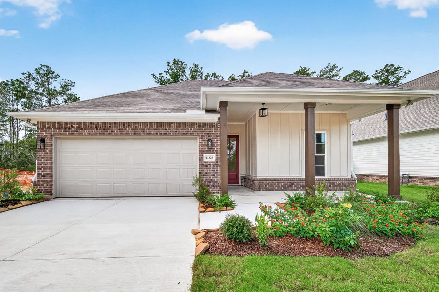 Front exterior of a new home in Two Step Farm, Montgomery, TX, highlighting curb appeal (Image 20).