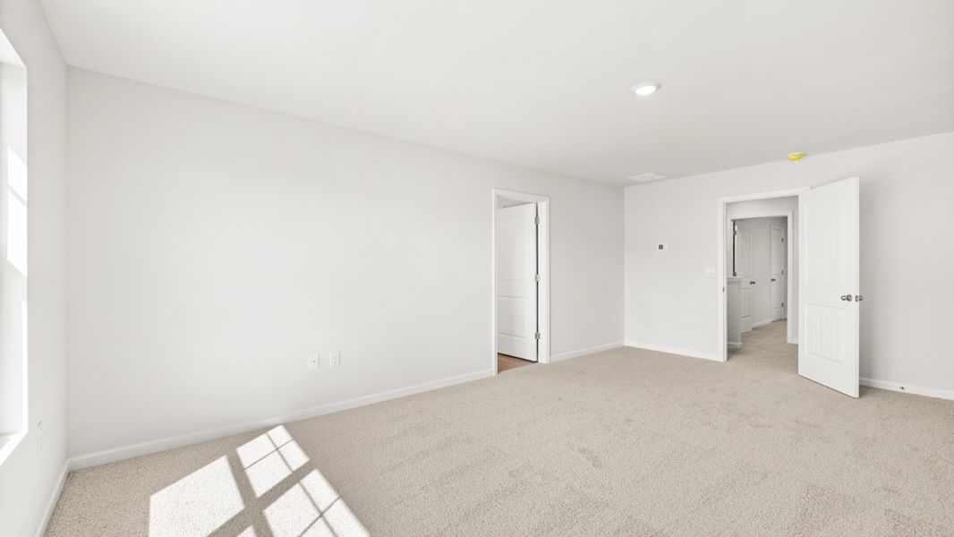 Representative unfurnished interior of a home built from the Hayden by D.R. Horton in Liberty Crossing, Braselton (Image 24).