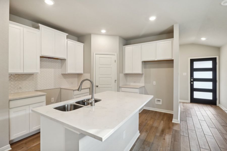 Kitchen in the Cascade floorplan at a Meritage Homes community.