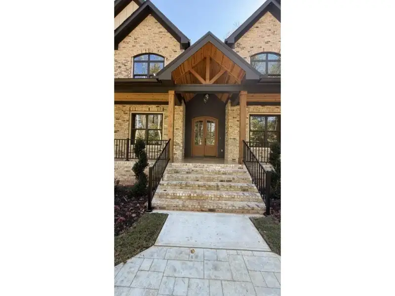 Exterior details and patio area of a home in , Hoschton (Image 24).