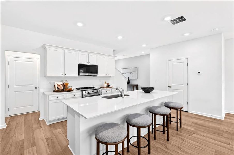 Furnished interior view inside a new home in Towns at Holly Springs, Holly Springs (Image 9). Furnished interior view inside a new home in Towns at Holly Springs, Holly Springs (Image 9).