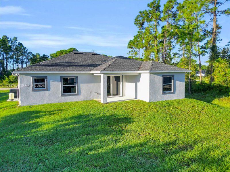 Exterior details and patio area of a home in , Lehigh Acres (Image 3).