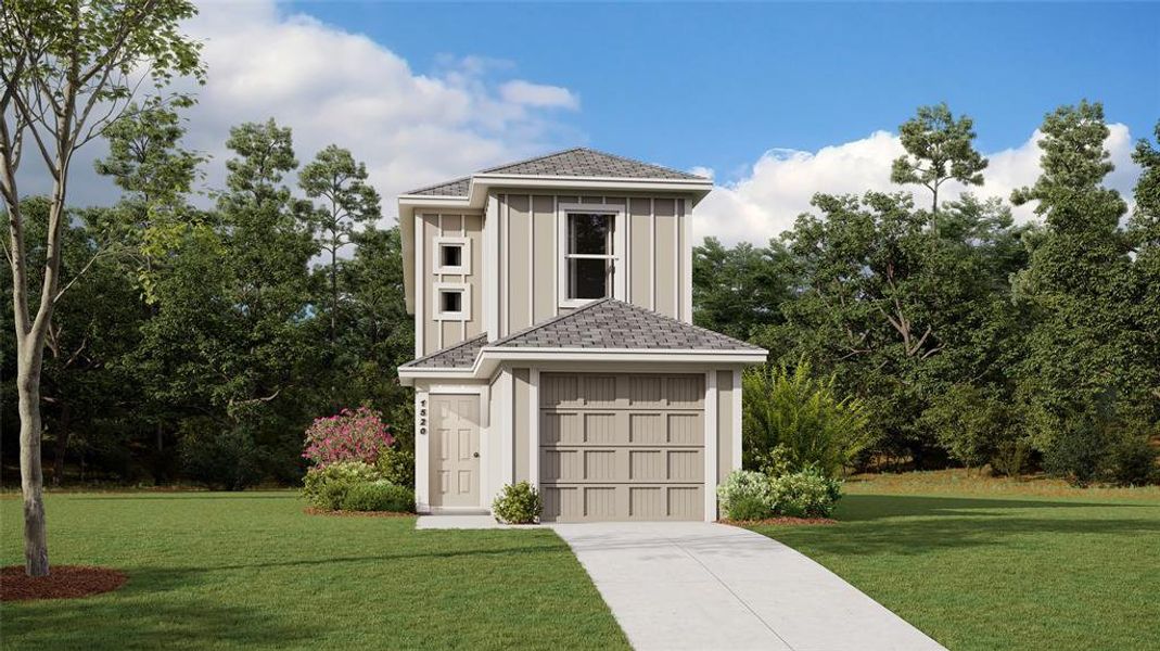 View of front of house featuring a garage and a front lawn