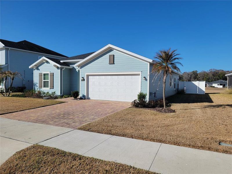 Front exterior of a new home in , Ocala, FL, highlighting curb appeal (Image 1). Front exterior of a new home in , Ocala, FL, highlighting curb appeal (Image 1).