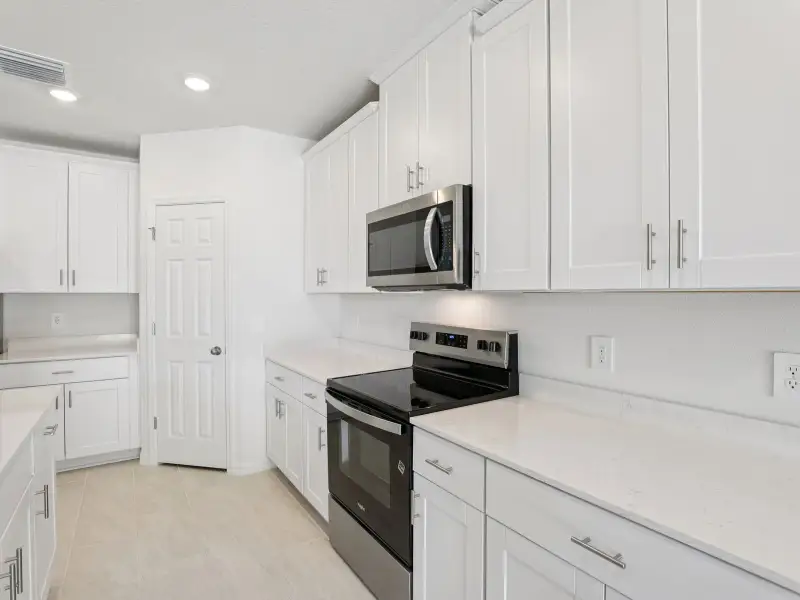 Furnished interior view inside a new home in Springs at Lake Alfred - Signature Series, Lake Alfred (Image 4). Furnished interior view inside a new home in Springs at Lake Alfred - Signature Series, Lake Alfred (Image 4).