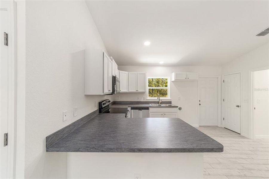 Furnished interior view inside a new home in , Dunnellon (Image 10). Furnished interior view inside a new home in , Dunnellon (Image 10).