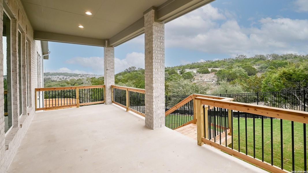 Exterior details and patio area of a home in Johnson Ranch 55', Bulverde (Image 26).