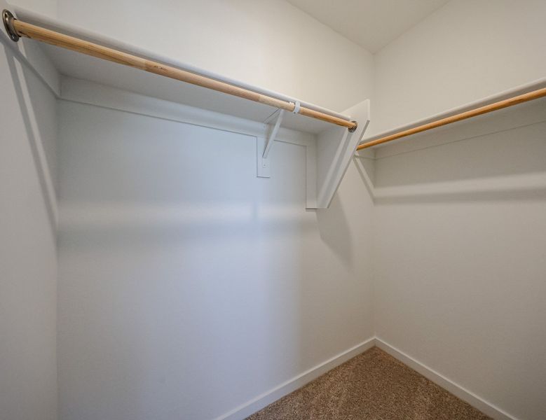 A white door with a metal railing.