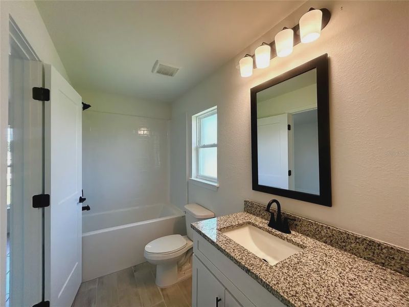 Furnished interior view inside a new home in Deep Creek, Punta Gorda (Image 9).