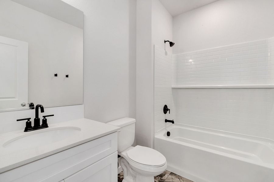 Representative furnished interior of a home built from the Stratton by Baessler Homes in Hudson Hills, Hudson (Image 14).