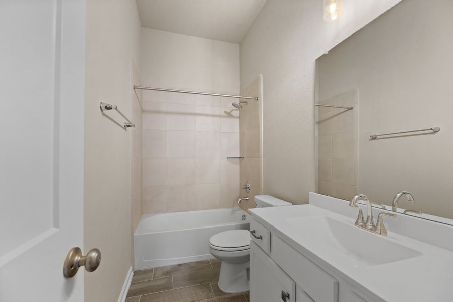 Furnished interior view inside a new home in Wood Leaf Reserve, Tomball (Image 5).