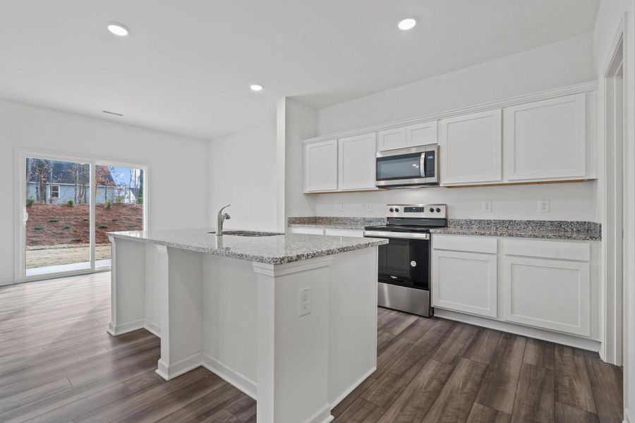 Furnished interior view inside a new home in Willow Springs, Buda (Image 5).