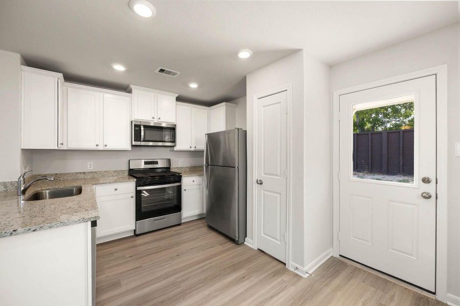 Furnished interior view inside a new home in Vacek Country Meadows, Richmond (Image 5).