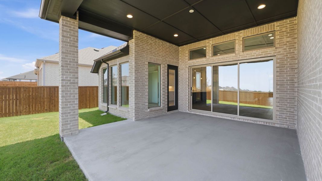 Exterior details and patio area of a home in Sweetgrass, Haslet (Image 4).