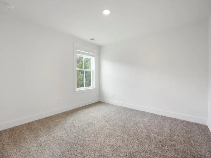 Spacious, unfurnished interior of a new home in The Coves at Lakes of Cane Bay, Summerville (Image 31). Spacious, unfurnished interior of a new home in The Coves at Lakes of Cane Bay, Summerville (Image 31).