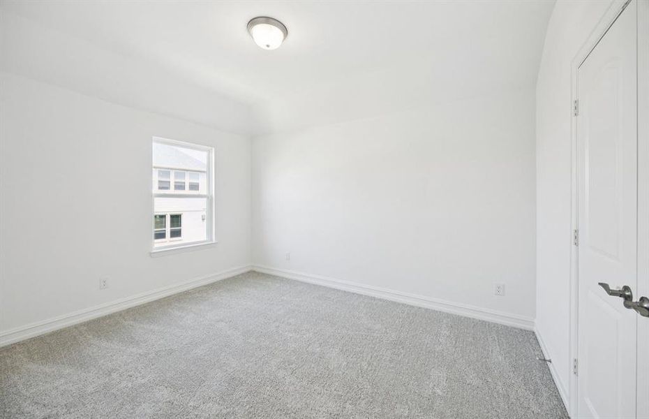 Spacious bedroom with windows