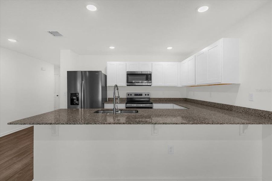 Furnished interior view inside a new home in Poinciana Village, Kissimmee (Image 7).