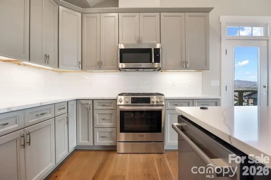 Kitchen with high end Bosch appliances. Similar Model Home. Kitchen with high end Bosch appliances. Similar Model Home.