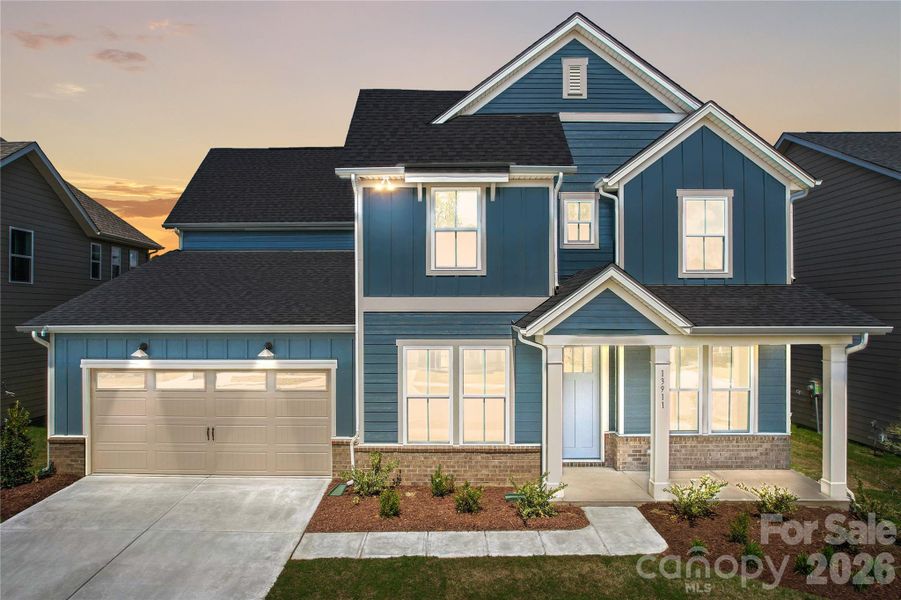 Front exterior of a new home in Parkside Crossing, Charlotte, NC, highlighting curb appeal (Image 25).