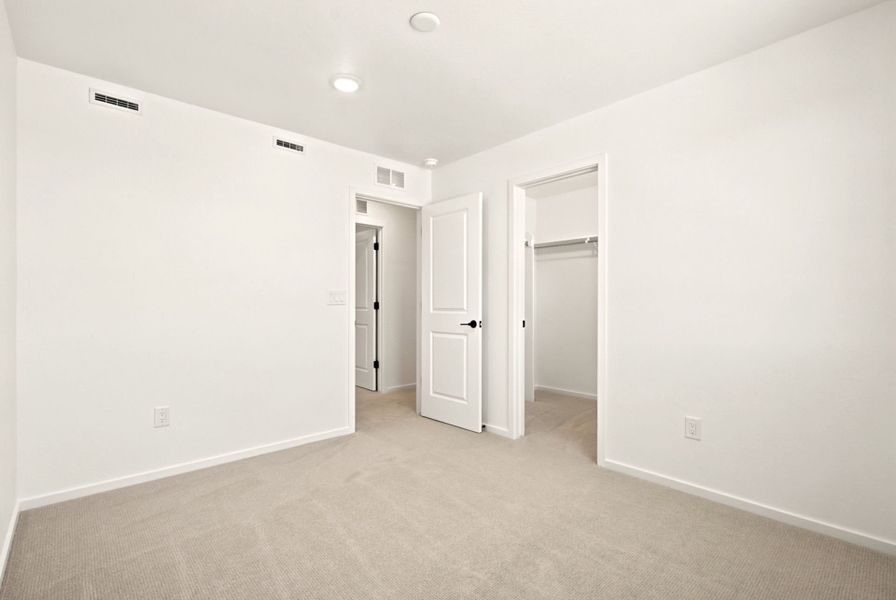 Spacious, unfurnished interior of a new home in Cordovan, Firestone (Image 19).