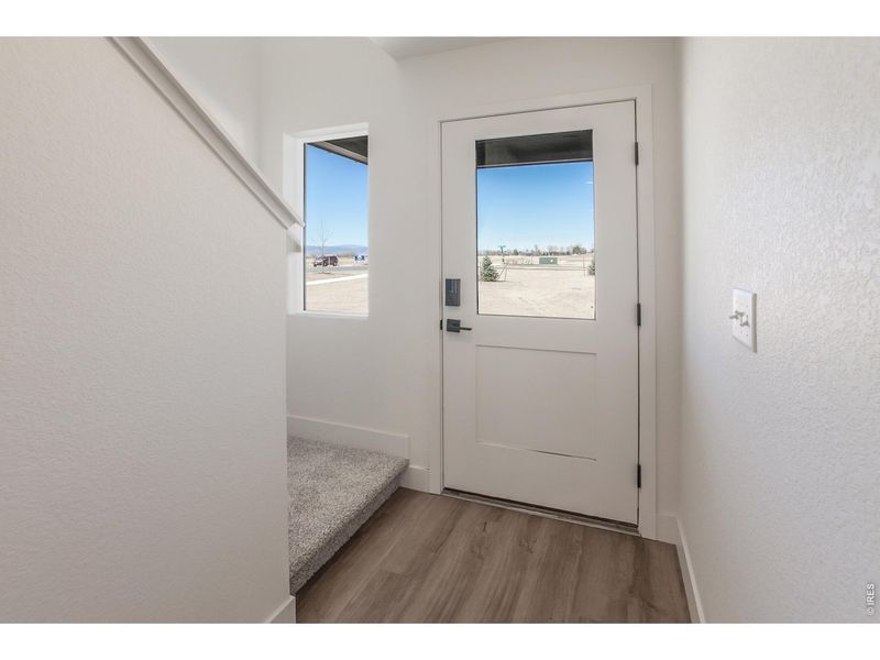 Spacious, unfurnished interior of a new home in Prairie Song Story Collection - Single Family Homes, Windsor (Image 20).