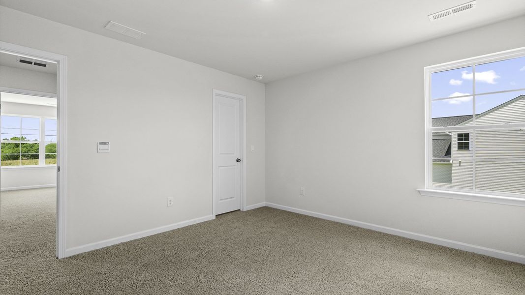 Spacious, unfurnished interior of a new home in The Landing at Summerhaven, Mebane (Image 16).
