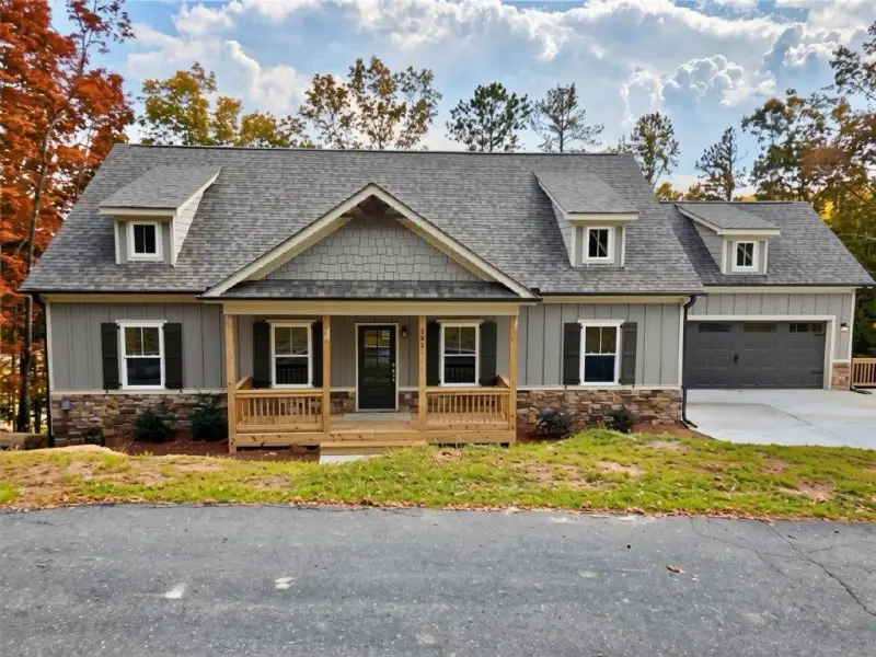Front exterior of a new home in , Waleska, GA, highlighting curb appeal (Image 1). Front exterior of a new home in , Waleska, GA, highlighting curb appeal (Image 1).