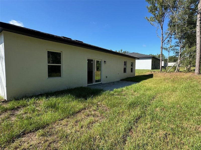 Exterior details and patio area of a home in , Citrus Springs (Image 3).
