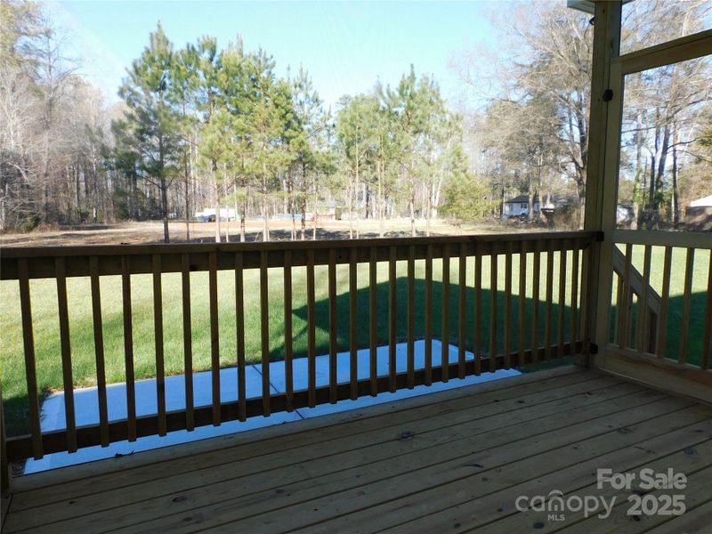 Covered porch view of rear