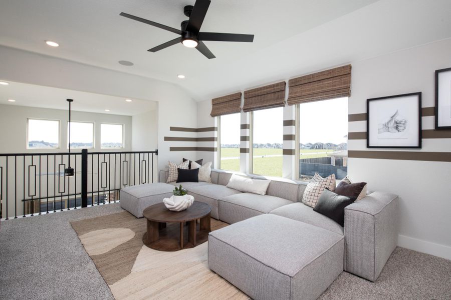 Representative furnished interior of a home built from the Sage by Tri Pointe Homes in Union Park, Little Elm (Image 5).