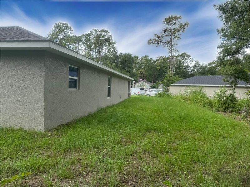 Exterior details and patio area of a home in , Dunnellon (Image 21).