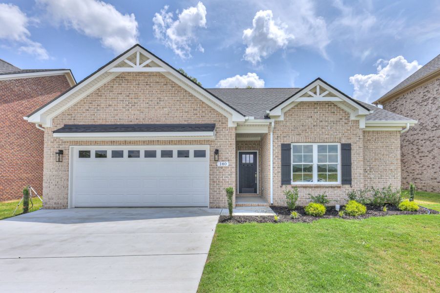 Front exterior of a new home in Legacy Preserve, Tullahoma, TN, highlighting curb appeal (Image 2).