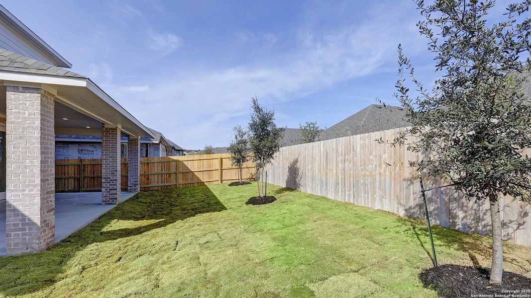 Exterior details and patio area of a home in Corley Farms 50', Boerne (Image 3).