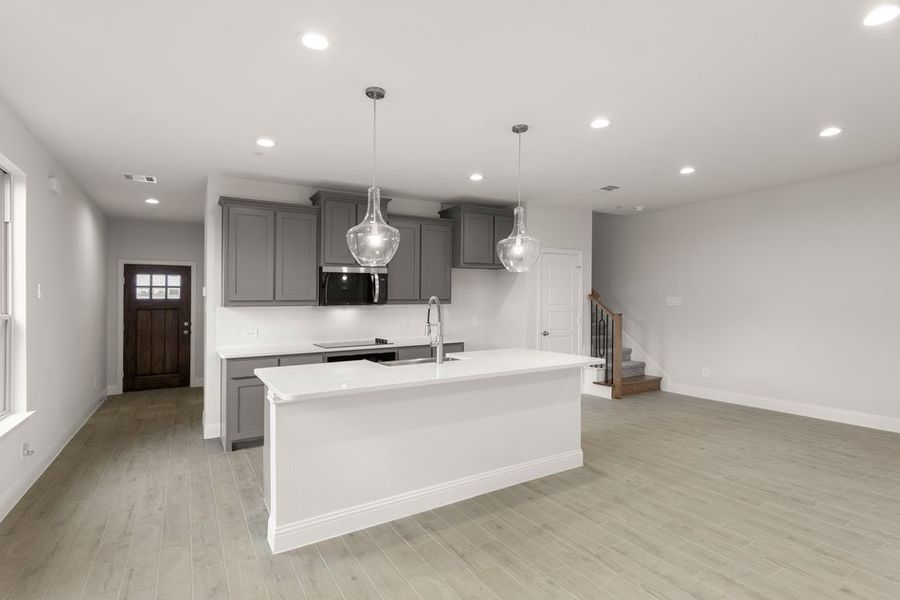 Representative exterior photo of a completed home built from the Opal by Impression Homes in Sereno Oaks at Buckner Terrace, Dallas, TX (Image 6). Representative exterior photo of a completed home built from the Opal by Impression Homes in Sereno Oaks at Buckner Terrace, Dallas, TX (Image 6).