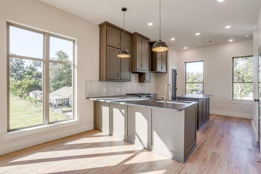 Custom cabinetry and thoughtful design make every inch of this condo shine. Custom cabinetry and thoughtful design make every inch of this condo shine.