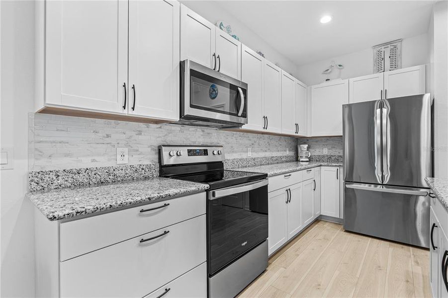 Furnished interior view inside a new home in , Daytona Beach (Image 14).