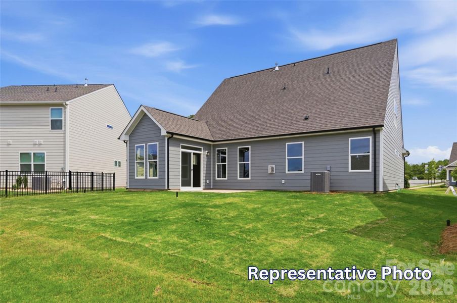 Exterior details and patio area of a home in Enclave at Riverdale, Huntersville (Image 24).