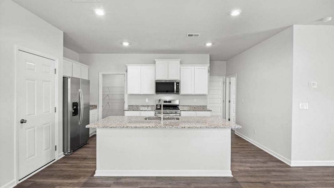 Furnished interior view inside a new home in Highland Hills, Graniteville (Image 3).