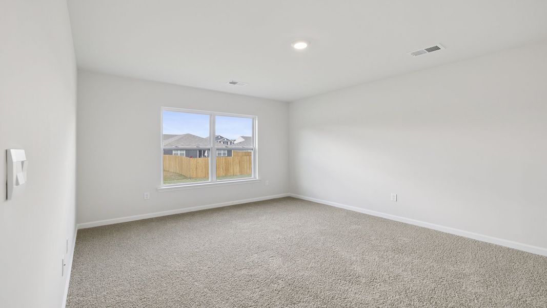 Spacious, unfurnished interior of a new home in Bentley Park, Greenwood (Image 26).