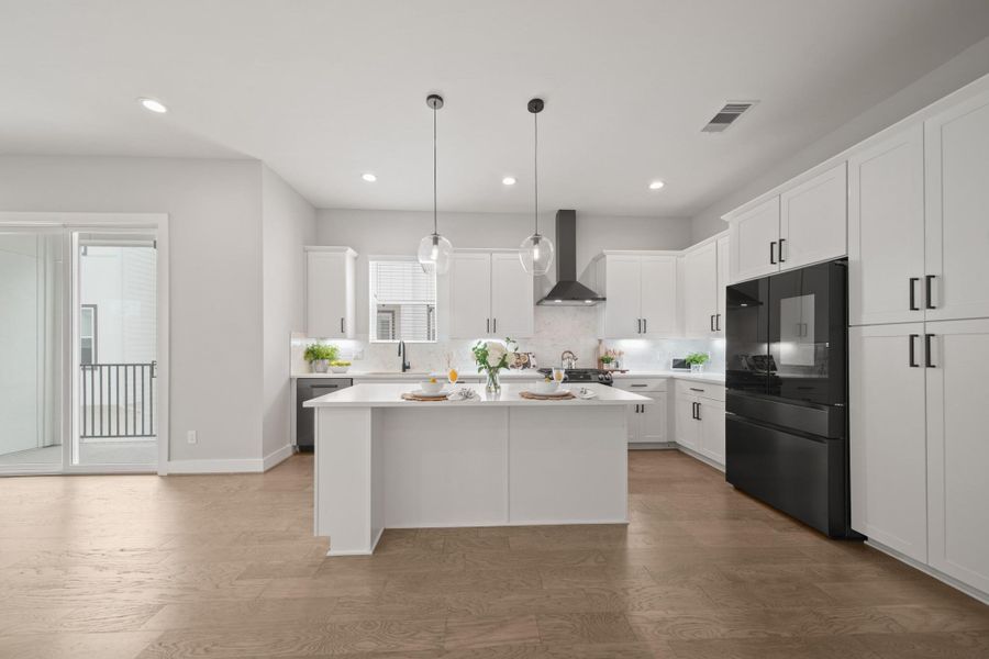 Open and spacious, the kitchen offers plenty of room to move around, with generous storage options to keep everything organized and within reach. Open and spacious, the kitchen offers plenty of room to move around, with generous storage options to keep everything organized and within reach.