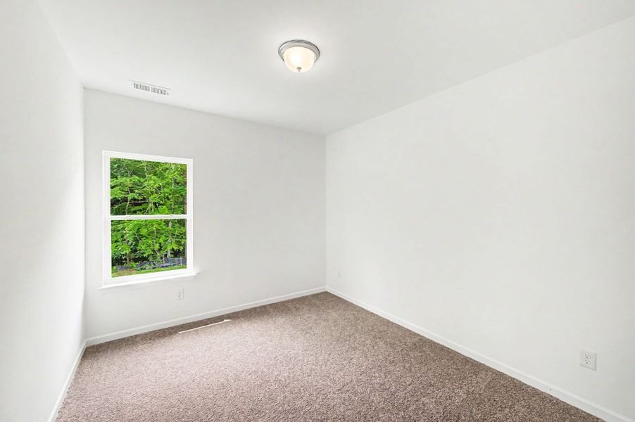 Spacious, unfurnished interior of a new home in Ironhorse, Dickson (Image 36).