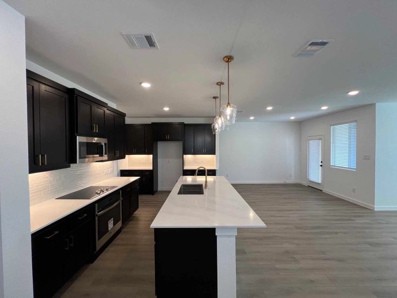 Open Kitchen-Dining Room Construction Progress featuring the Oxford Collection