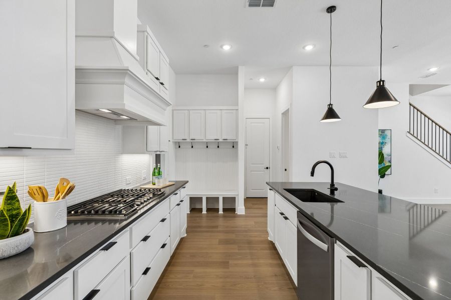 Representative furnished interior of a home built from the Roosevelt by Centre Living Homes in Newman Village Townhomes, Frisco (Image 12).
