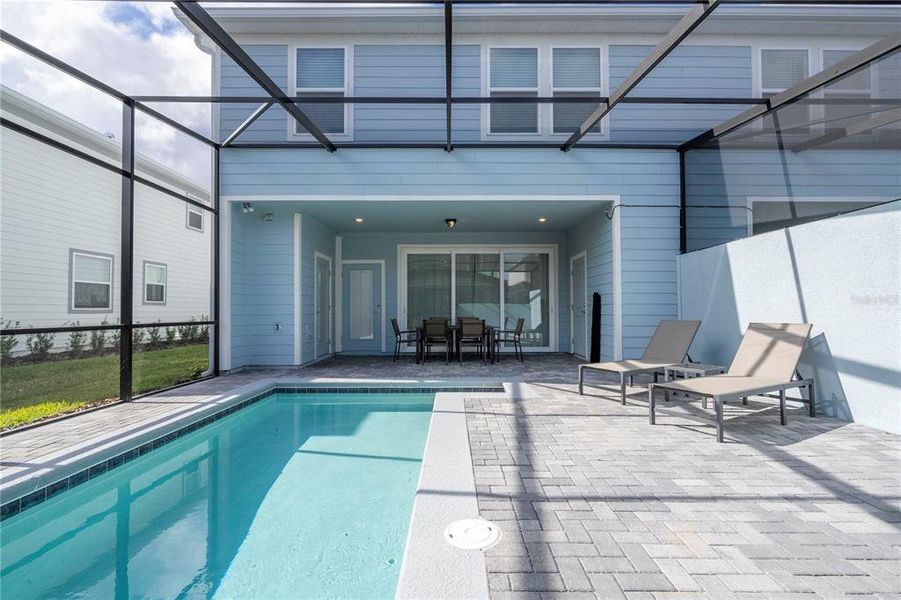 Exterior details and patio area of a home in Windsor Cay Resort, Clermont (Image 21).