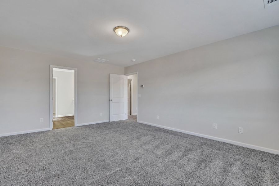 Representative unfurnished interior of a home built from the The Cypress by Smith Family Homes in Heritage at New Riverside, Bluffton (Image 25).