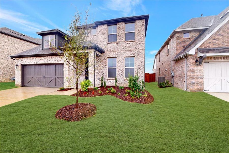 Front exterior of a new home in Lilybrooke at Legacy Hills, Celina, TX, highlighting curb appeal (Image 21).