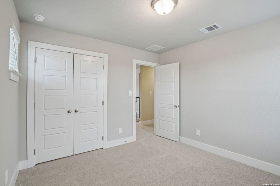 Spacious, unfurnished interior of a new home in Lark Canyon, New Braunfels (Image 38).